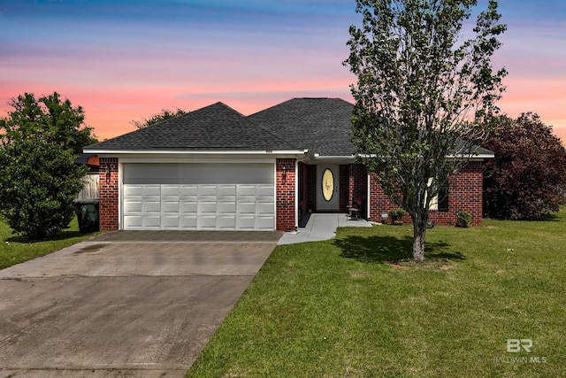 1500 Thames Dr, Foley, AL 36535 - single story home with a front yard, brick siding, driveway, and an attached garage