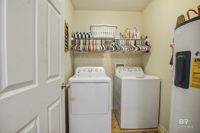 1500 Thames Dr, Foley, AL 36535 - laundry area with independent washer and dryer, electric water heater, and laundry area