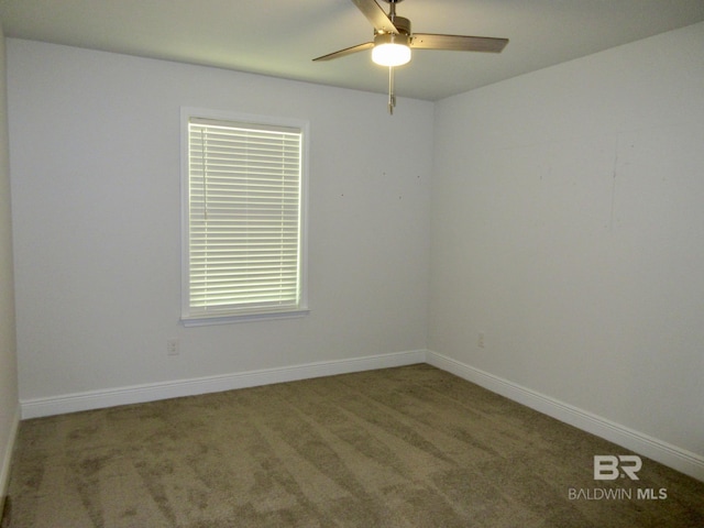 carpeted empty room with ceiling fan