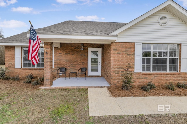 rear view of house featuring a patio