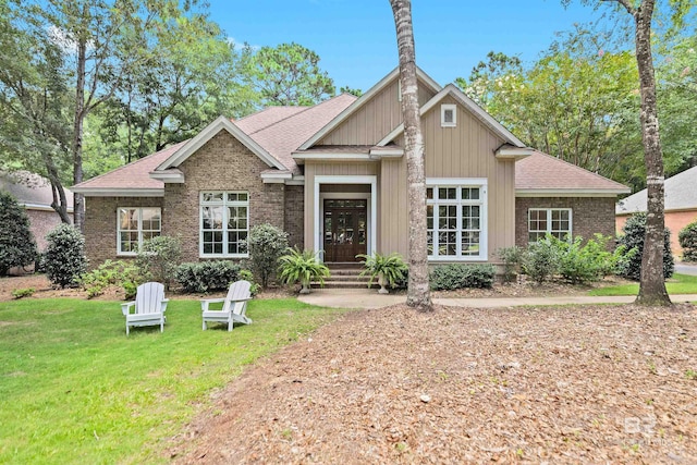 view of front of home with a front yard