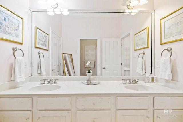 bathroom with vanity and an inviting chandelier