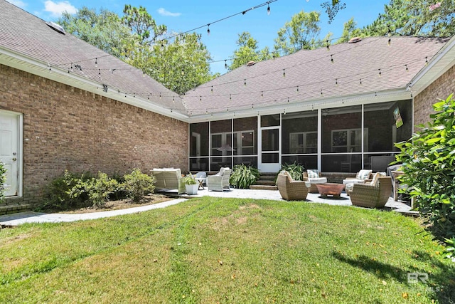 back of house featuring a yard, an outdoor hangout area, a patio, and a sunroom