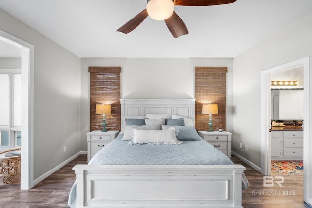 bedroom with ensuite bathroom, hardwood / wood-style floors, and ceiling fan