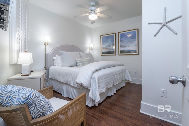 bedroom with ceiling fan, baseboards, and wood finished floors