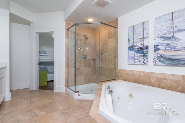 bathroom featuring visible vents, a stall shower, and a tub with jets