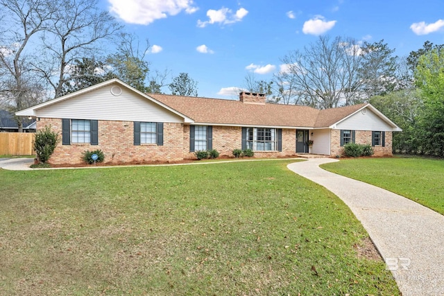 ranch-style house featuring brick siding, a front lawn, fence, roof with shingles, and a chimney