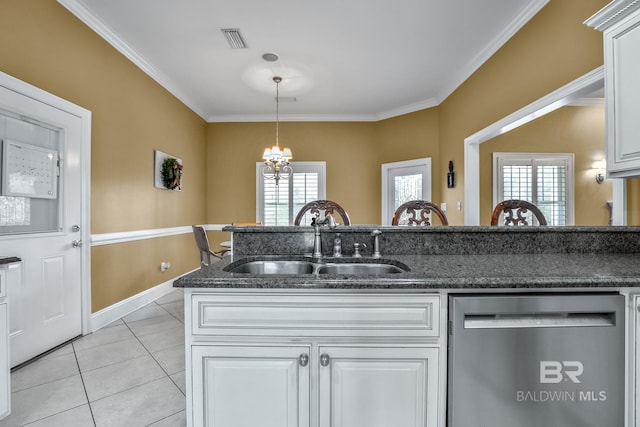 kitchen featuring white cabinets, stainless steel dishwasher, a chandelier, and sink