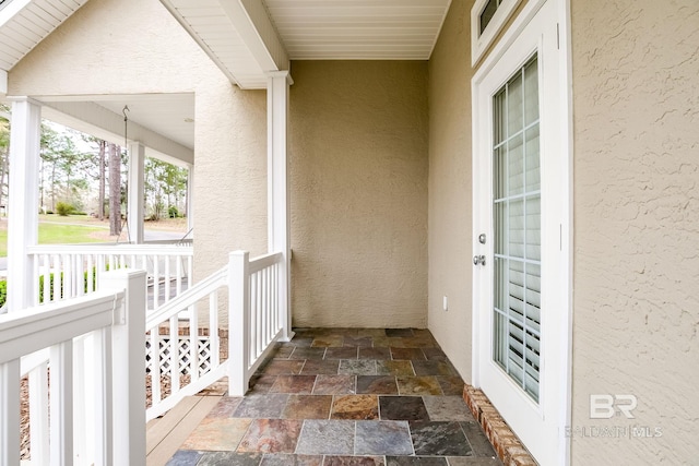 balcony featuring covered porch