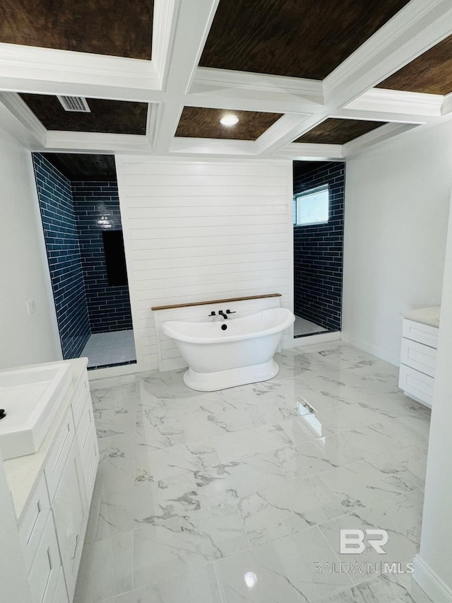 bathroom featuring vanity, coffered ceiling, a stall shower, and a soaking tub