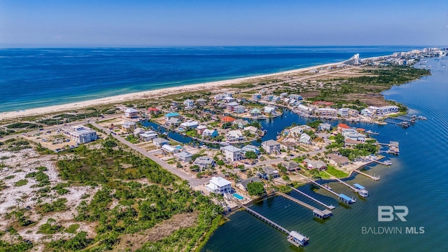 bird's eye view featuring a beach view and a water view