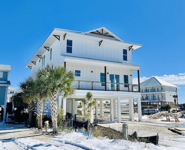7258 Captain Kidd Reef, Pensacola, FL 32507 - view of front of property featuring board and batten siding and covered porch