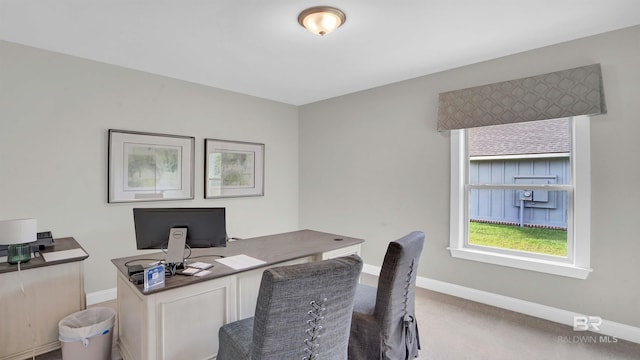 carpeted office with baseboards