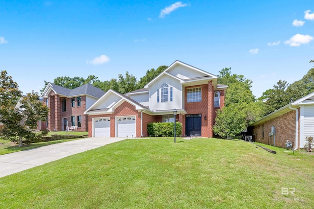 view of front of property featuring a front yard and a garage