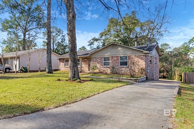 ranch-style home with a front lawn