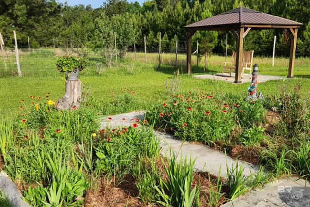 18255 Cactus Ct, Elberta, AL 36530 - view of home's community with a lawn, fence, and a gazebo