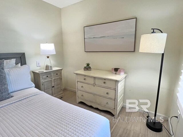 bedroom featuring light hardwood / wood-style floors