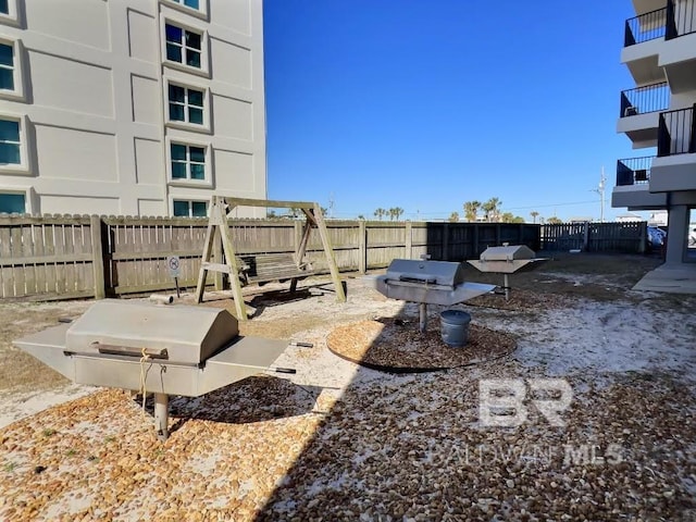 view of yard featuring a balcony