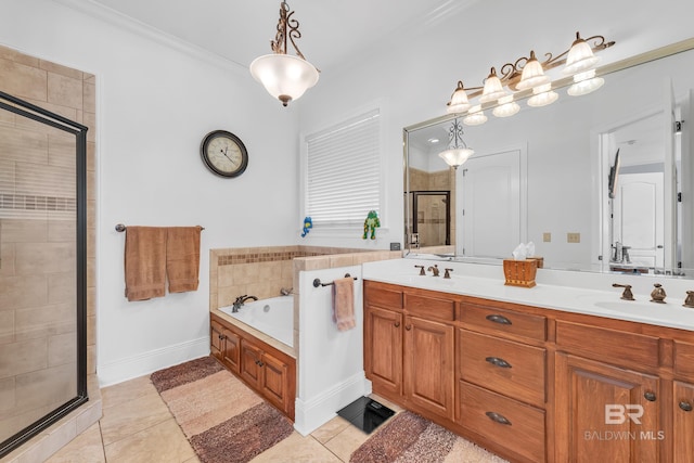 bathroom with a sink, tile patterned floors, a stall shower, and double vanity