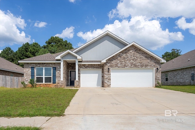 craftsman-style home with a front yard and a garage