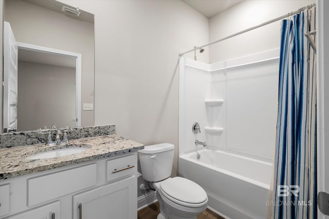 full bathroom featuring hardwood / wood-style floors, vanity, toilet, and shower / bath combo with shower curtain