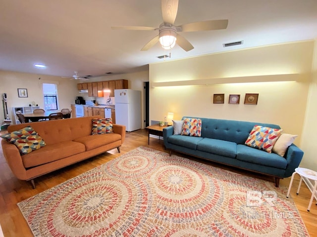 106 Ryan Ct, Dauphin Island, AL 36528 - living room featuring light wood-type flooring, a ceiling fan, and recessed lighting