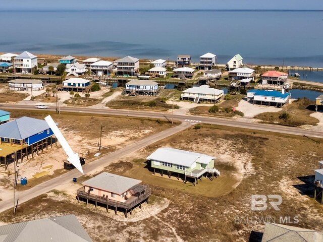 106 Ryan Ct, Dauphin Island, AL 36528 - aerial perspective of suburban area with a nearby body of water