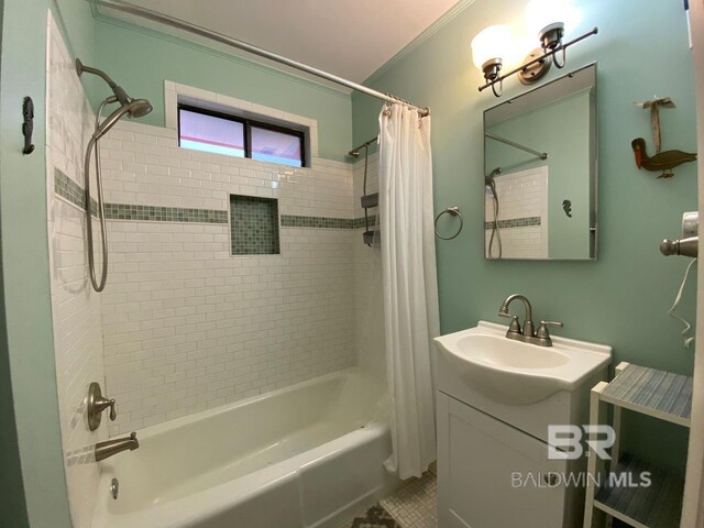 106 Ryan Ct, Dauphin Island, AL 36528 - full bath with shower / bathtub combination with curtain, vanity, crown molding, and tile patterned flooring