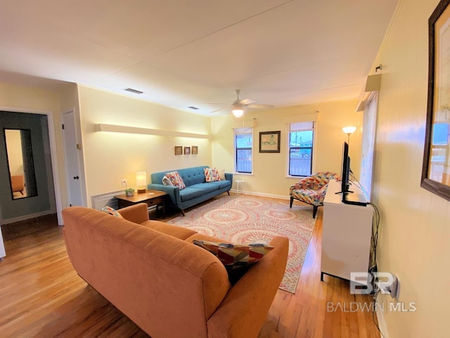 106 Ryan Ct, Dauphin Island, AL 36528 - living area with wood finished floors and a ceiling fan