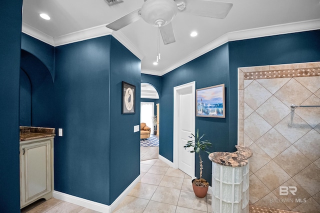 full bathroom featuring tile patterned floors, a ceiling fan, crown molding, recessed lighting, and baseboards