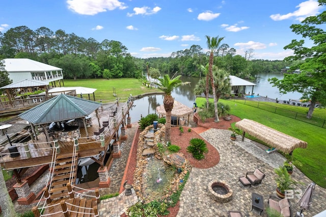 view of yard with a gazebo and a water view