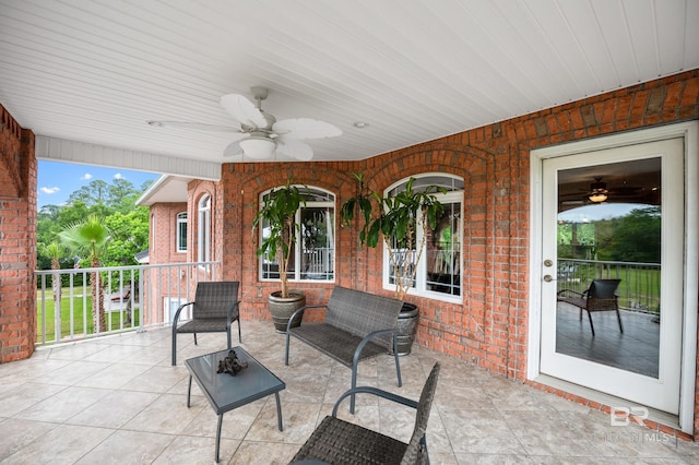 view of patio / terrace featuring ceiling fan