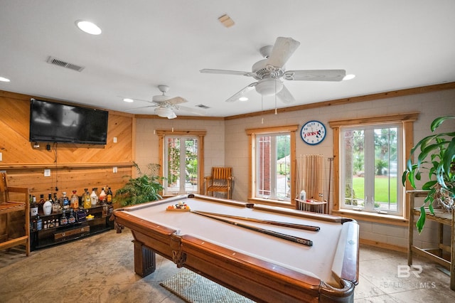 rec room featuring healthy amount of natural light, wood walls, recessed lighting, a ceiling fan, and billiards