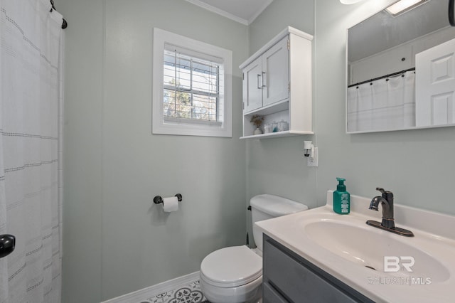 bathroom with crown molding, vanity, toilet, and a shower with shower curtain