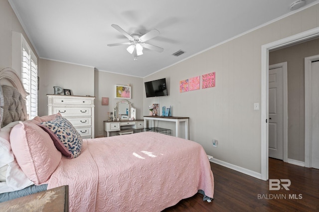 bedroom with ornamental molding, dark hardwood / wood-style floors, and ceiling fan