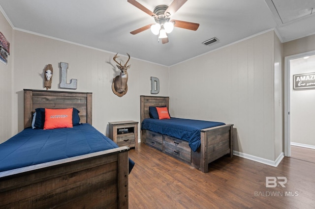 bedroom featuring ceiling fan, ornamental molding, and dark hardwood / wood-style flooring