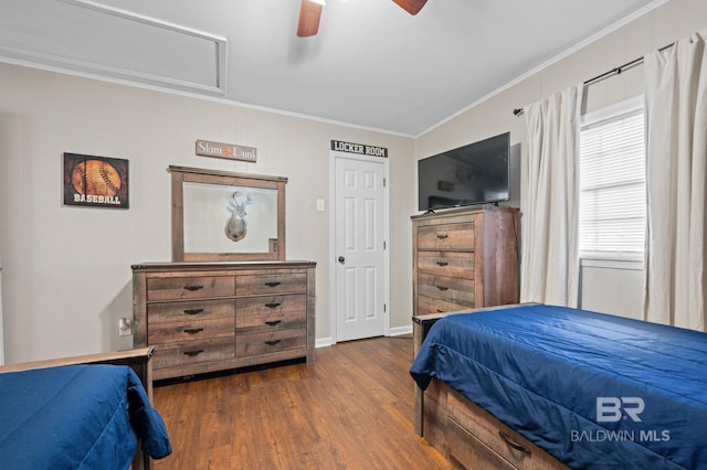 bedroom featuring dark hardwood / wood-style flooring, ornamental molding, and ceiling fan