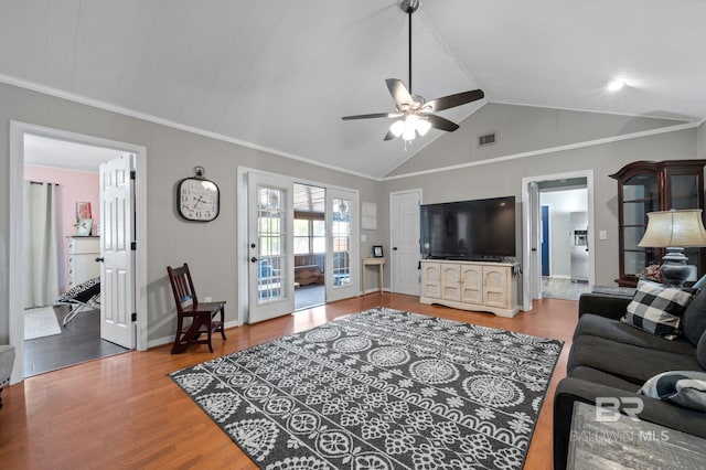 living room featuring crown molding, vaulted ceiling, hardwood / wood-style floors, and ceiling fan