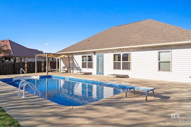 17163 Feder Dr, Foley, AL 36535 - view of swimming pool featuring a fenced in pool, a diving board, fence, and a patio