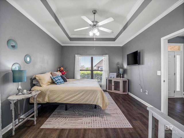 17163 Feder Dr, Foley, AL 36535 - bedroom featuring ornamental molding, baseboards, a raised ceiling, ceiling fan, and wood finished floors