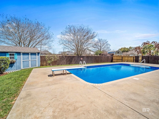 17163 Feder Dr, Foley, AL 36535 - view of swimming pool with an outdoor structure, a fenced backyard, a fenced in pool, and a patio area