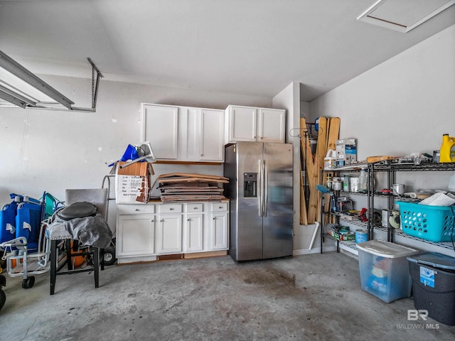 17163 Feder Dr, Foley, AL 36535 - garage featuring stainless steel refrigerator with ice dispenser