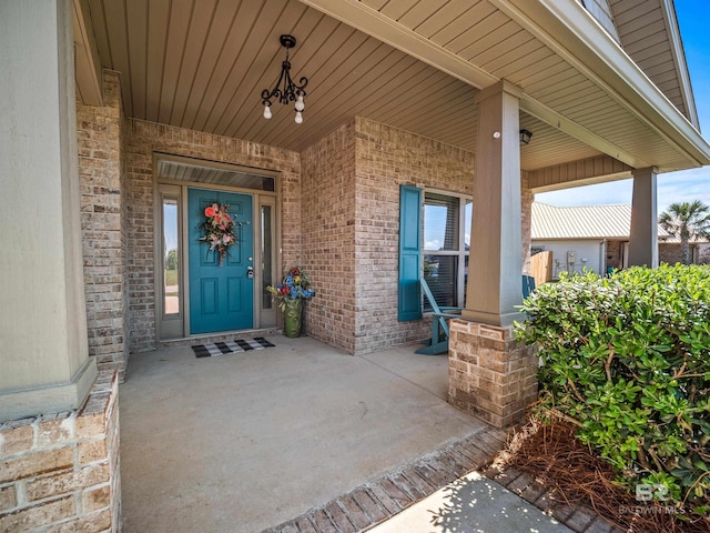 17163 Feder Dr, Foley, AL 36535 - entrance to property featuring a porch and brick siding