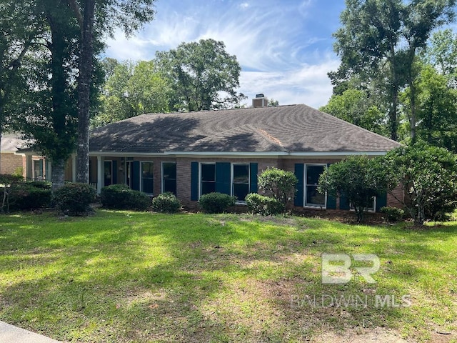 6805 Hunters Ct, Mobile, AL 36695 - ranch-style house featuring a front lawn, a chimney, and brick siding