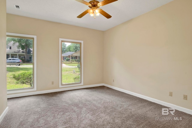 6805 Hunters Ct, Mobile, AL 36695 - unfurnished room featuring healthy amount of natural light, carpet flooring, and baseboards