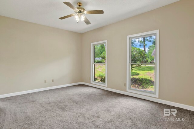 6805 Hunters Ct, Mobile, AL 36695 - carpeted spare room featuring baseboards and a ceiling fan