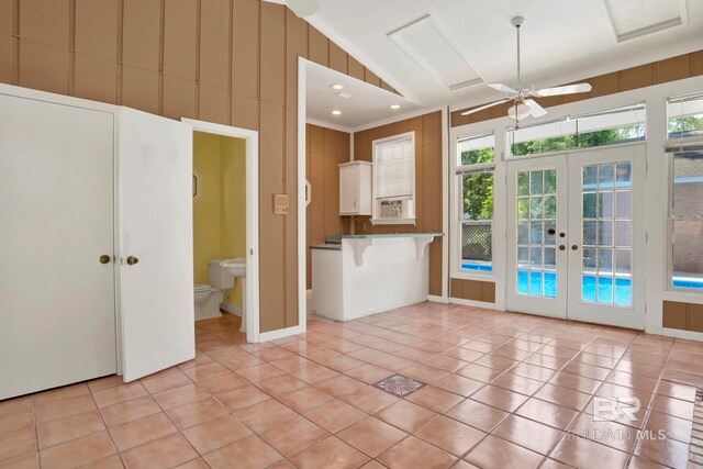 6805 Hunters Ct, Mobile, AL 36695 - kitchen with french doors, healthy amount of natural light, light tile patterned floors, ceiling fan, and high vaulted ceiling