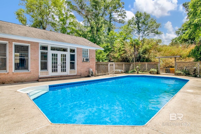 6805 Hunters Ct, Mobile, AL 36695 - view of swimming pool featuring french doors and cooling unit