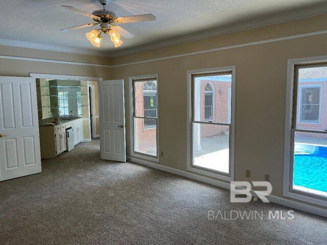 6805 Hunters Ct, Mobile, AL 36695 - unfurnished bedroom featuring carpet floors, ornamental molding, a textured ceiling, and ceiling fan