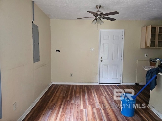 19930 Shepard Lake Rd, Mount Vernon, AL 36560 - unfurnished dining area featuring electric panel, wood finished floors, a textured ceiling, and ceiling fan